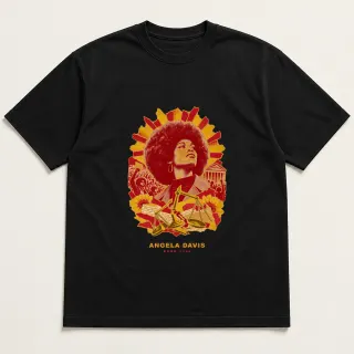 Front of a black tee with a three-color mixed-media design for Angela Davis