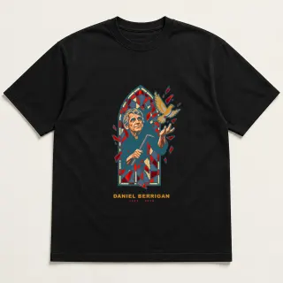 Front of a black tee with a four-color pixel-art design for Daniel Berrigan
