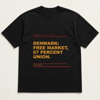 Front of a black tee reading "Denmark: free market, 67 percent union." with the Democratic socialism page address printed under it