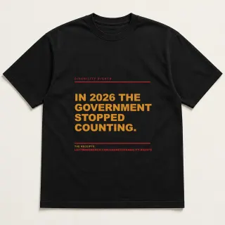 Front of a black tee reading "In 2026 the government stopped counting." with the Disability rights page address printed under it