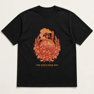 Front of a black tee with a two-color engraved design for The Eight-Hour Day