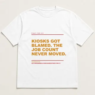 Front of a white tee reading "Kiosks got blamed. The job count never moved." with the Fight for $15 page address printed under it
