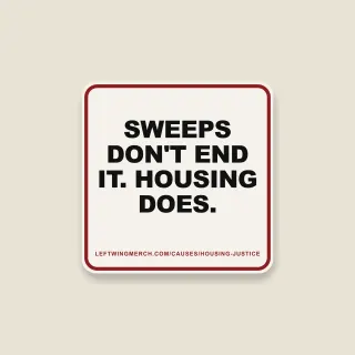 A cream square sticker with a red frame reading "Sweeps don't end it. Housing does."