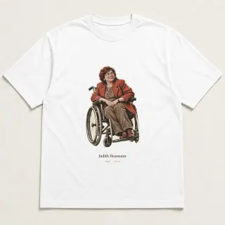 Front of a white tee carrying the unfinished hand Judith Heumann design