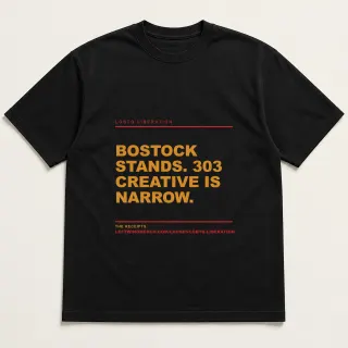 Front of a black tee reading "Bostock stands. 303 Creative is narrow." with the LGBTQ Liberation page address printed under it