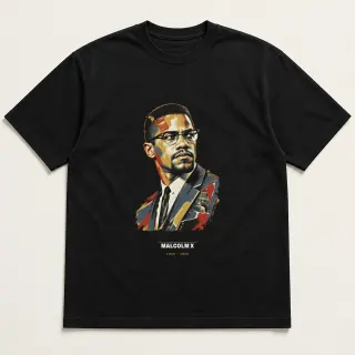 Front of a black tee carrying the mixed media Malcolm X design