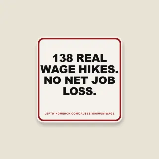 A cream square sticker with a red frame reading "138 real wage hikes. No net job loss."