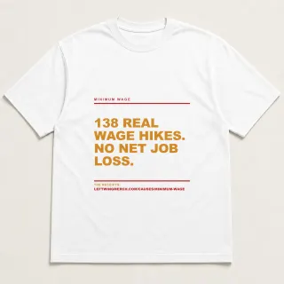 Front of a white tee reading "138 real wage hikes. No net job loss." with the Minimum Wage page address printed under it