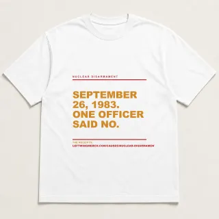 Front of a white tee reading "September 26, 1983. One officer said no." with the Nuclear Disarmament page address printed under it