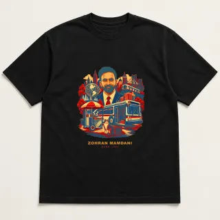 Front of a black tee with a four-color pixel-art design for Zohran Mamdani